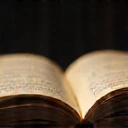 Open book with glowing pages